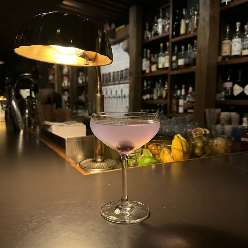 The Aviation cocktail, dim candlelight at Robin Room.