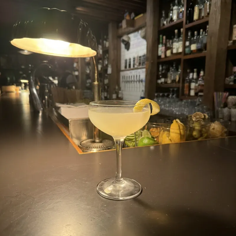 The Corpse Reviver 2 cocktail, dim candlelight at Robin Room.