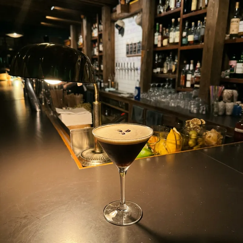 The Espresso Martini cocktail, dim candlelight at Robin Room.