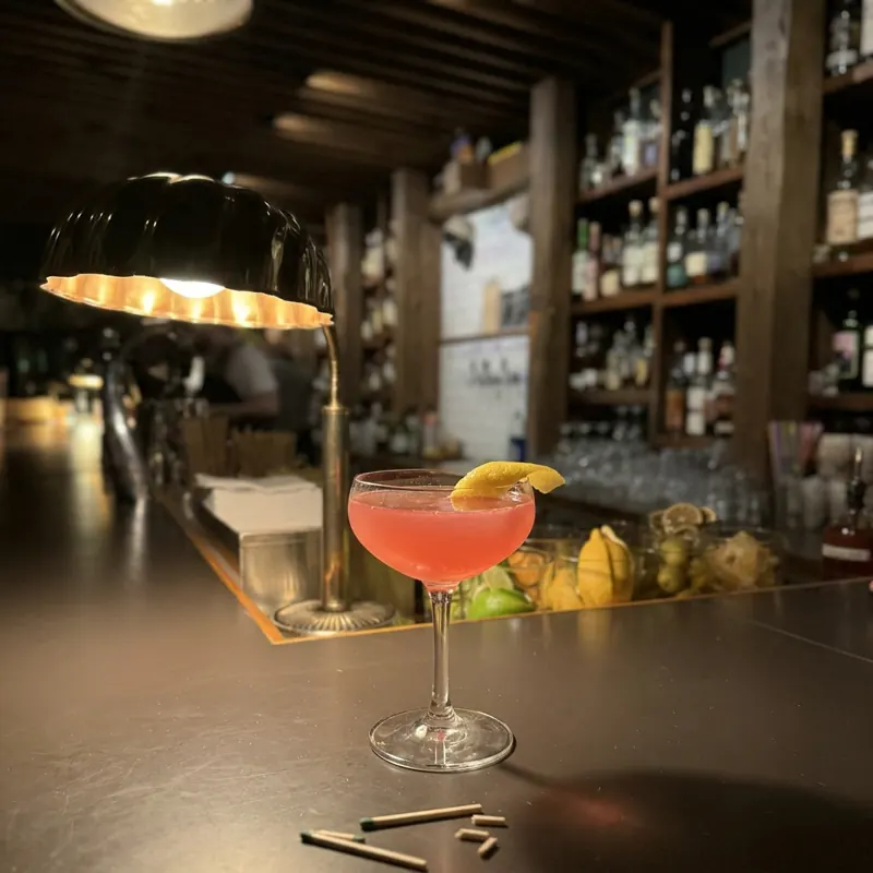 The Jack Rose cocktail, dim candlelight at Robin Room.