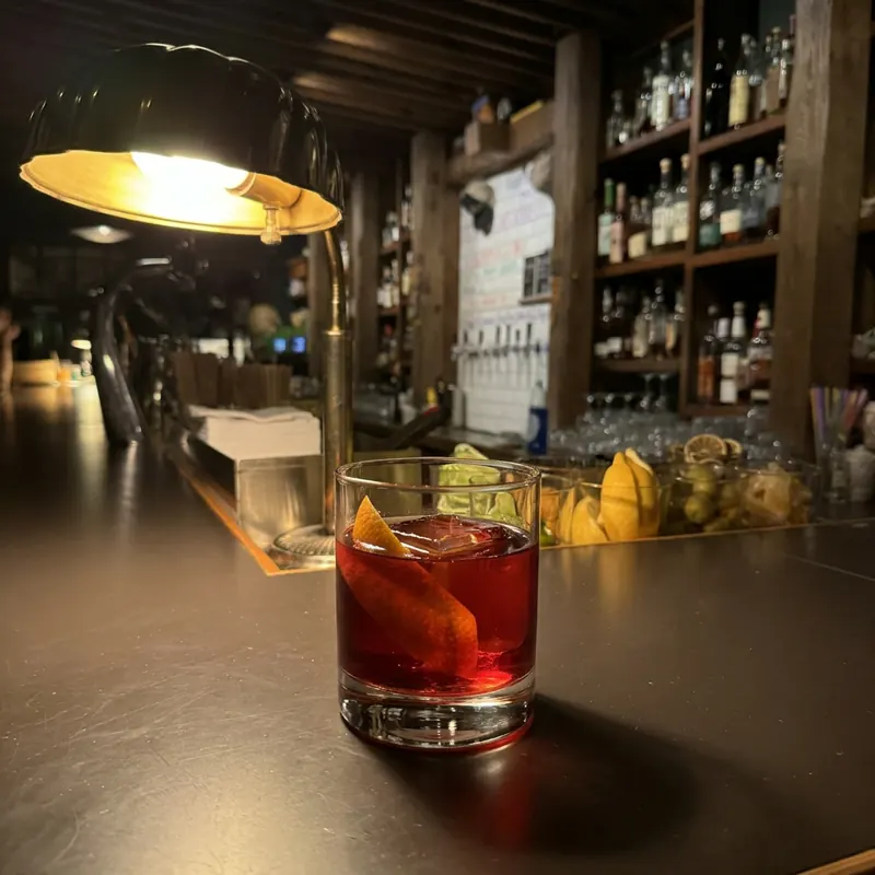 The Kingston Negroni cocktail, dim candlelight at Robin Room.