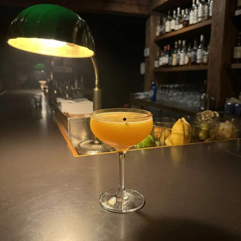 The Leatherwing cocktail, photographed on the bar at Robin Room.