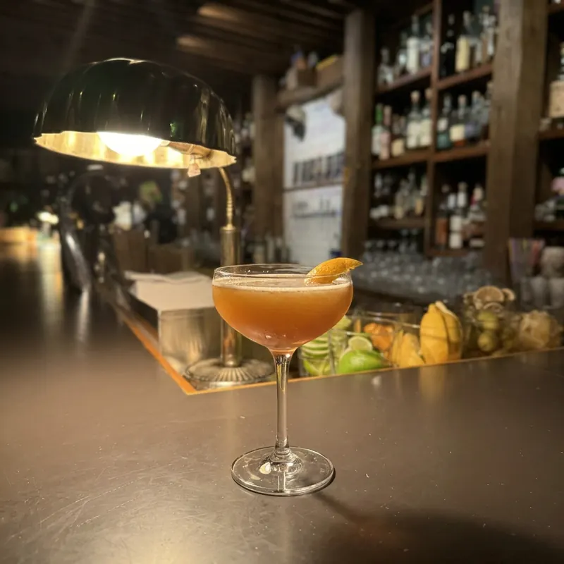 The Pantheon cocktail, dim candlelight at Robin Room.