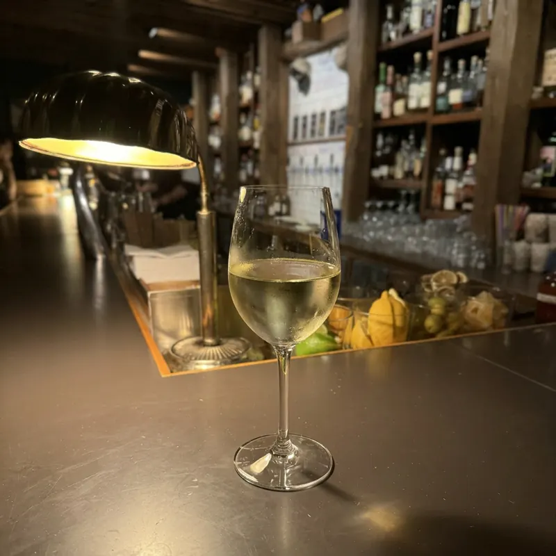 The Quinta De Santiago Vinho Verde cocktail, dim candlelight at Robin Room.