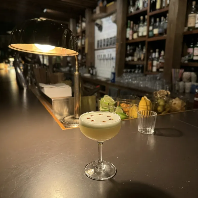 The Rattlesnake cocktail, dim candlelight at Robin Room.